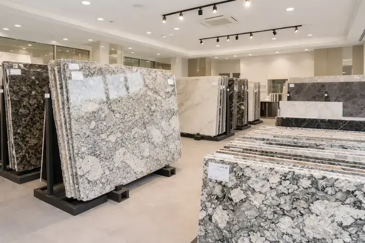 Granite Girl showroom in Alvin, TX featuring granite, marble, and quartz slabs